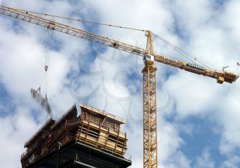 Royalty Free Photo of a Crane on a Building
