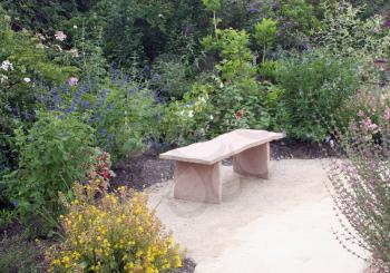 Royalty Free Photo of a Bench in a Garden