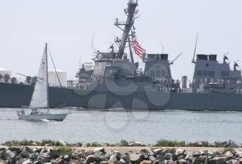 Royalty Free Photo of a Navy Ship Coming Back To It's Home Port In San Diego