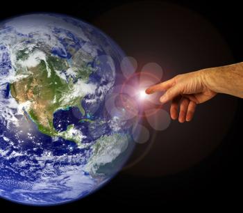 Royalty Free Photo of a Hand and Planet Earth