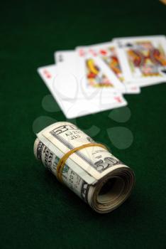 Royalty Free Photo of Playing Cards and Money