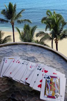 Royalty Free Photo of Playing Cards in Paradise