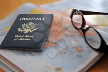 Royalty Free Photo of a Map and Passport