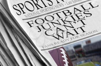 Royalty Free Photo of a Football Newspaper Article