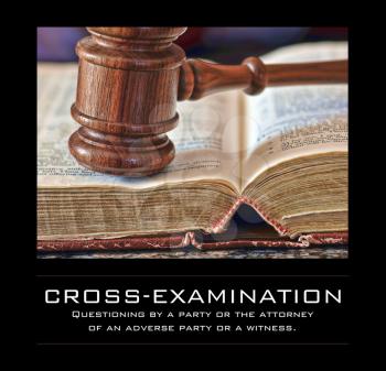 Royalty Free Photo of a Gavel and Book Background With a Definition for Cross-Examination
