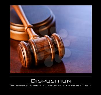 Royalty Free Photo of a Gavel With the Definition of Disposition