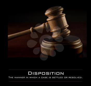 Royalty Free Photo of a Gavel With a Definition for Disposition
