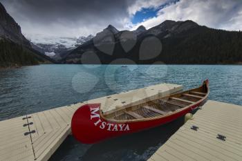 Several rental canoes on the last day of the season at Lake Louise, Banff National Park, Alberta, Canada.
