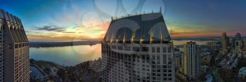 This is an 5 image sunset aerial panoramic of the hotel district in San Diego, California, USA.
