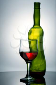 Royalty Free Photo of a Wine Bottle and Glass