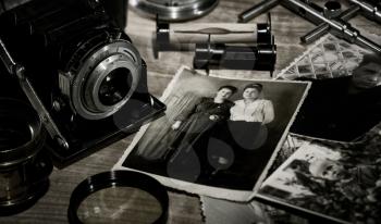 Royalty Free Photo of a Vintage Image With a Camera and Photographs