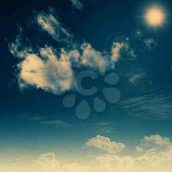 Summer sky. Abstract retro styled backgrounds with old cardboard texture