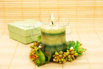 Royalty Free Photo of a Candle and Present