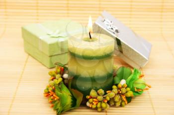 Royalty Free Photo of a Candle and Presents