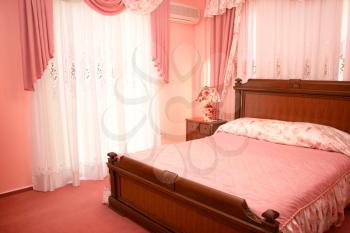 Royalty Free Photo of a Pink Bedroom