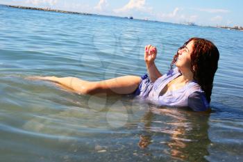 Royalty Free Photo of a Woman Sitting in Water