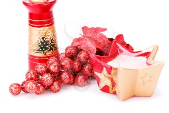 Christmas grapes decoration and candles isolated on white background.