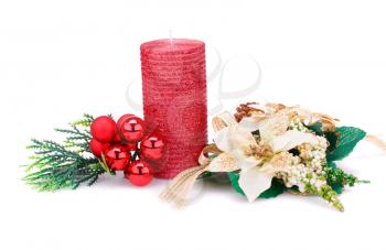 Christmas candle, balls and  flower decoration isolated on white background.