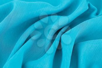 Blue fabric as a background.