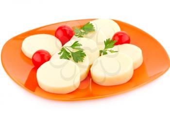 Mozzarella cheese with tomato and parsley on the plate.