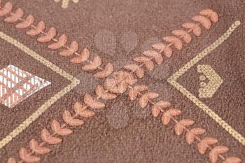 Brownl fabric background closeup picture.