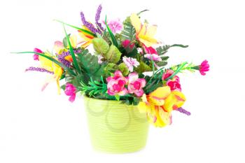 Colorful fabric flowers in vase isolated on white background.