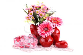Flowers in vases, red heart glass, necklaces, gift boxes isolated on white background.