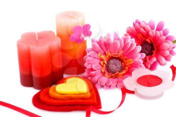 Colorful hearts, daisy flowers and candles isolated on white background.