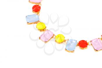 Stylish necklace with colorful stones isolated on white background.