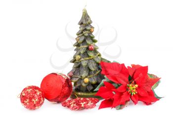 Fir tree candle, balls and holly berry flower isolated on white background.