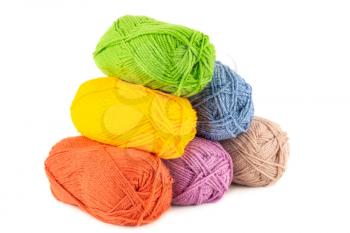 The stack of knitting yarn clews isolated on white background.