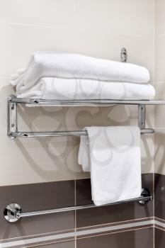 Clean white towel on a hanger