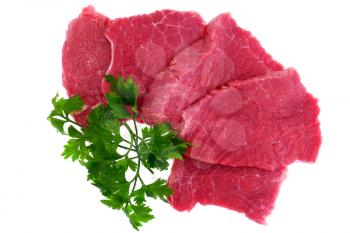 Cut of  beef steak  with parsley. Isolated.