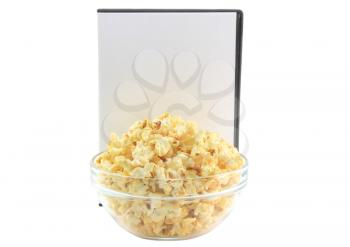 Bowl full of caramel popcorn with DVD disk . Isolated