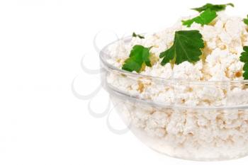 Fresh cottage cheese (curd) in glass bow, isolated on white background.