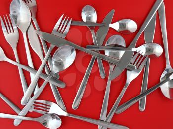 Table serving-knife,plate,fork and   on  red background. Texture