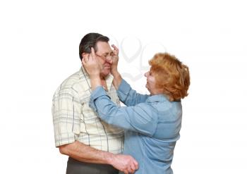 Old couple, wife puts on her husband glasses. Isolated.