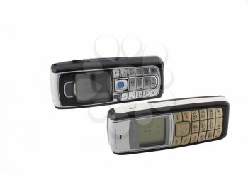 Antiques, old cellular(mobile) phones. Isolated on white.