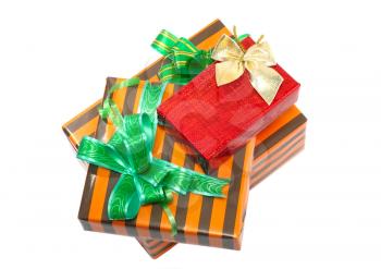 Pile of Christmas and New Year gift boxes. Isolated over white background