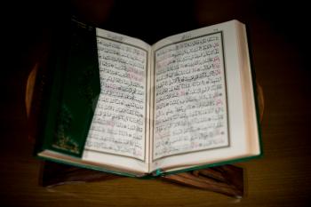 pages of holy koran the testament