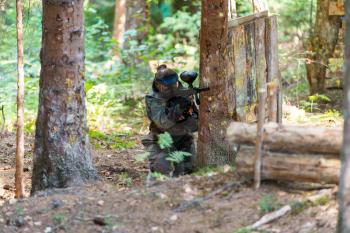 Paintball Player Hide Behind Tree