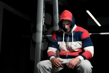 Man Resting After Exercises In Gym