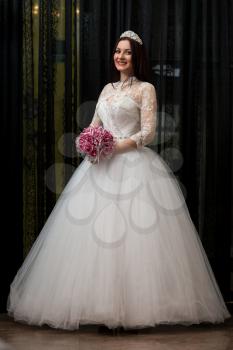 Bride Holding Her Wedding Flowers