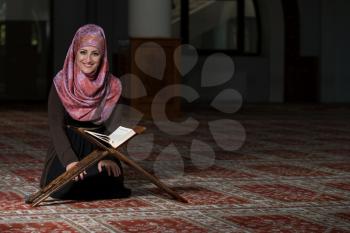 Muslim Woman Reading Holy Islamic Book Koran