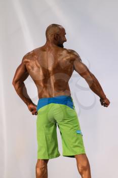 Bodybuilder On A competition For The Win - Back Poses