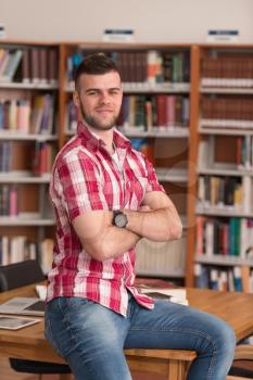 Portrait Of Clever Caucasian Student In College Library - Shallow Depth Of Field