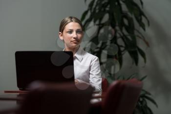 Portrait Of A Young Business Woman Using Laptop At Office - Businesswoman Working Online