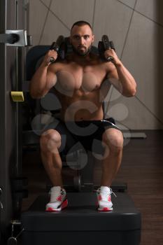 Big Man Using A Press Machine In A Fitness Club - Dont Skip Leg Day