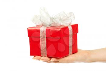 Royalty Free Photo of a Hand Holding a Gift Box