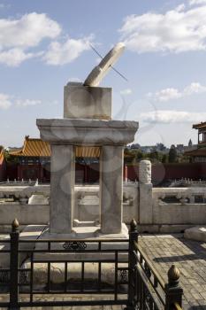 Sun dial to keep time in ancient times in China at the Forbidden City